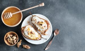 Grilled,pears,baked,with,ricotta,cheese,and,walnuts.,honey,topping.